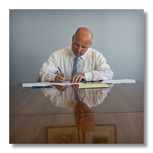 Dan Kelly at his desk